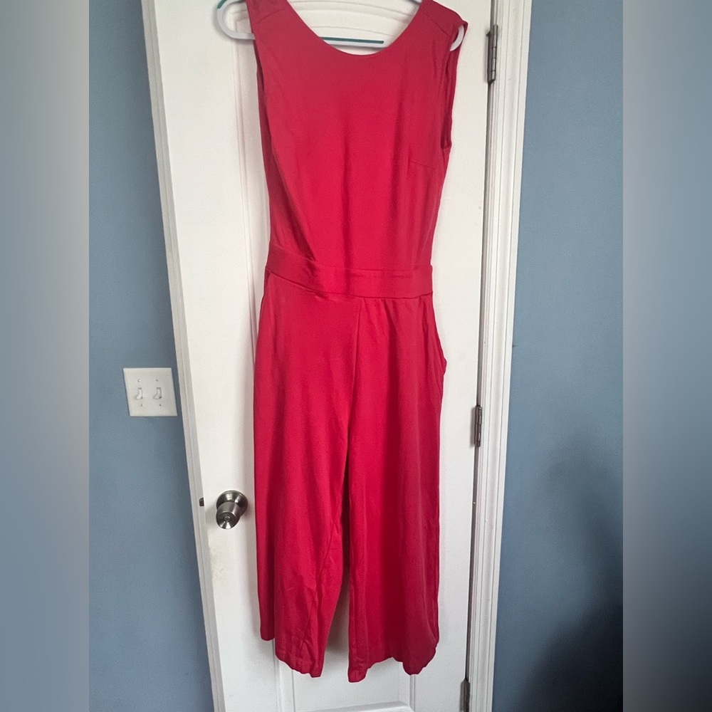 New York & Company Vibrant salmon-colored Jumpsuit